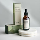 Natural herbal hair serum bottle promoting healthy, shiny hair and scalp nourishment