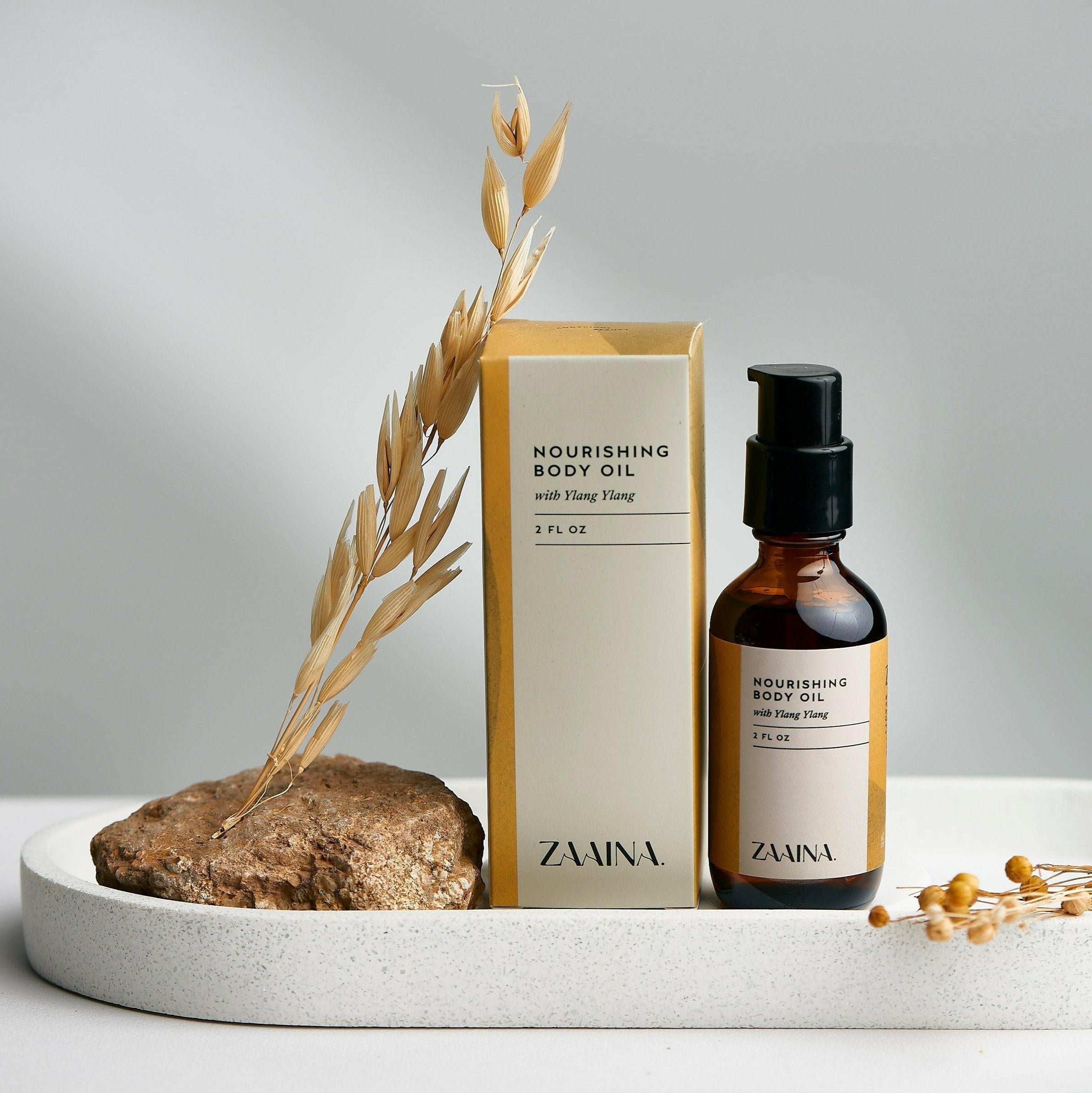 Luxurious ylang ylang body oil for smooth, nourished skin with calming floral fragrance, ideal for daily skincare routines.