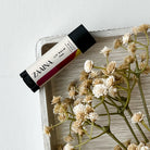 Natural lip balm to hydrate and nourish lips, providing organic moisture for soft, healthy-looking skin.