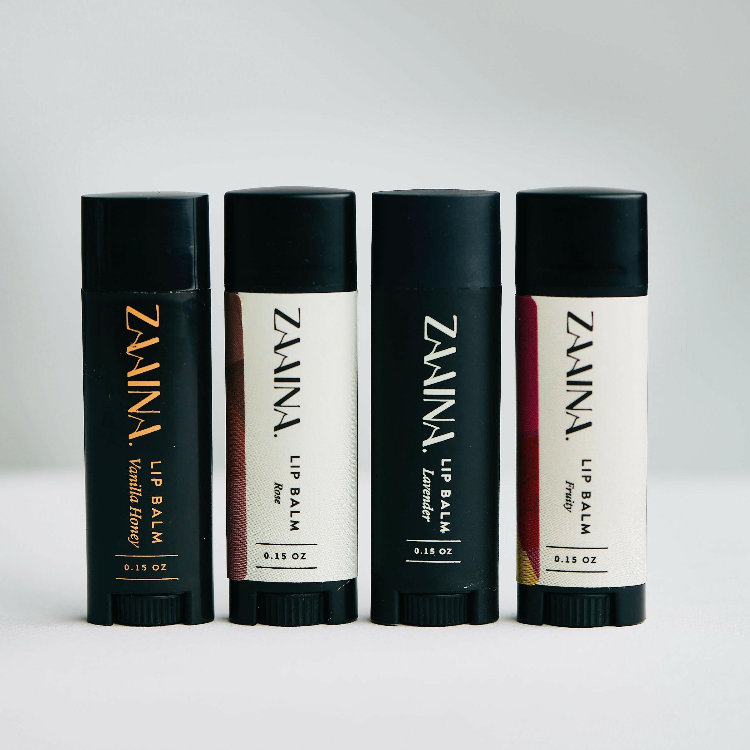 Natural lip balm hydrates and nourishes lips for soft, smooth results; moisturizing formula ideal for daily use.