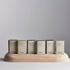 Handmade natural soap for a radiant skincare routine on a bathroom tray with green leaves, gentle and eco-friendly.